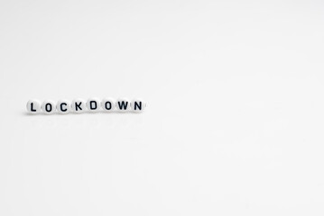 Fototapeta premium The word lock down isolated over white background