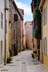 It's Street in the Old town of Antibes, Cote d'Azur, France. Antibes was founded as a 5th-century BC Greek colony and was called Antipolis