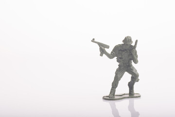 Fototapeta na wymiar A toy soldier isolated over white background
