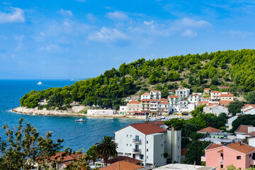 Fototapeta na wymiar It's Hotels and other houses at the coast of Croatia