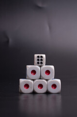 Group of dices isolated over dark background