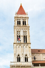 It's Bell tower of the Cathedral of St. Lawrence (Katedrala Sv. Lovre), a Roman Catholic triple-naved basilica constructed in Romanesque-Gothic in Trogir, Croatia. UNESCO World heritage