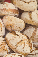 Fresh loaves of rye or wheat bread