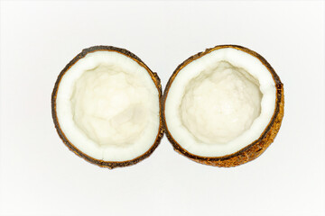 Fresh and organic half coconut on white background.