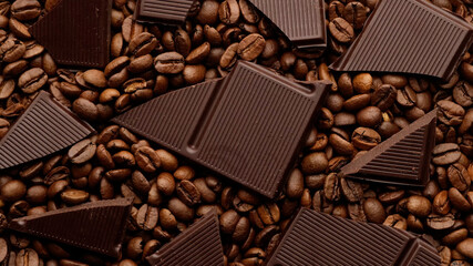broken chocolate bar and roasted coffee beans top view