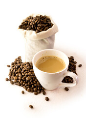 bag of coffee beans with cup of fresh coffee
