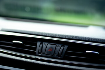 Obraz na płótnie Canvas close up of a emergency stop button in the car