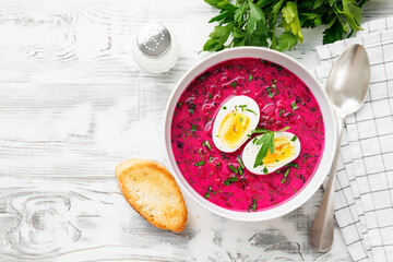 Summer Cold beetroot soup with fresh vegetables and boiled egg.