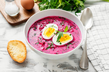 Summer Cold beetroot soup with fresh vegetables and boiled egg.