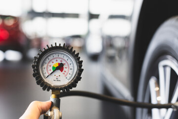 close up of a hand holding a gas pump