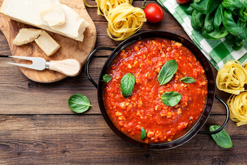 Traditional italian bolognese sauce with chicken meat for pasta or spaghetti. top view