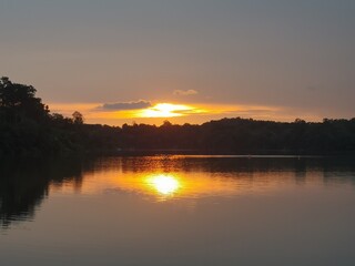 Obraz na płótnie Canvas Sunset landscape at the Singapore's reservoir