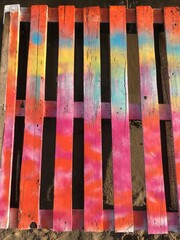 Fototapeta premium box of soson boards painted with beams of different colors