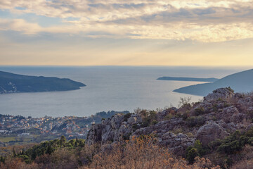 Twilight. Calm winter evening in Mediterranean.  Montenegro, view of  Adriatic Sea and coastline of Kotor Bay from mountainside of Dinaric Alps