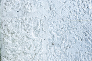 White broken tile wall texture background.
