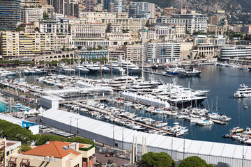 View of the Principality of Monaco and port with sailing and fishing boats