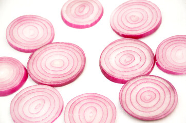 red onion slices isolated on white background