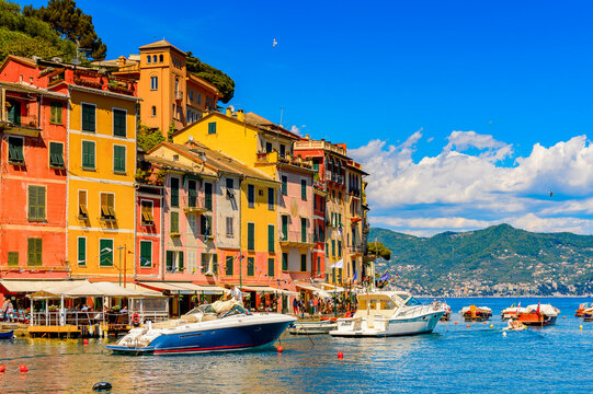 It's Portofino, is an Italian fishing village, Genoa province, Italy. A vacation resort with a picturesque harbour and with celebrity and artistic visitors.