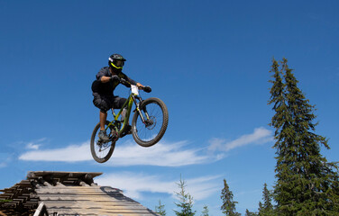Fototapeta na wymiar mountain bike jump in a mtb race