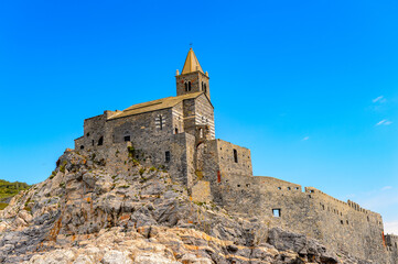 It's Stone Church of St. Peter in Porto Venere, Italy. Porto Venere and the villages of Cinque Terre are the UNESCO World Heritage Site.