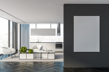 White kitchen and living room with poster