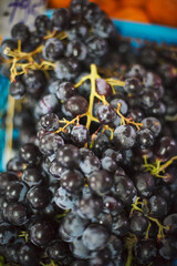 dark Grapes for sale at market Closeup