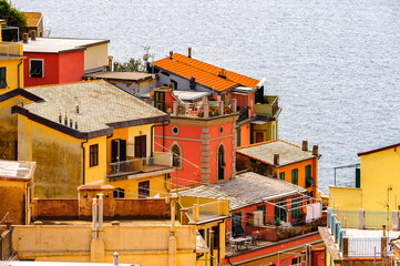 Fototapeta na wymiar It's Architecture of Riomaggiore, a village in province of La Spezia, Liguria, Italy. It's one of the lands of Cinque Terre, UNESCO World Heritage Site