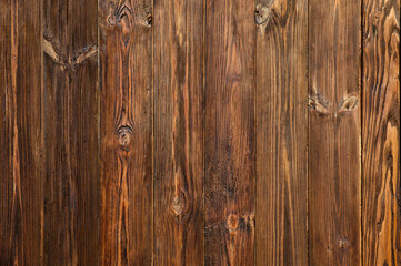 Fototapeta premium Wood texture. Dark brown upright lacquered wood planks