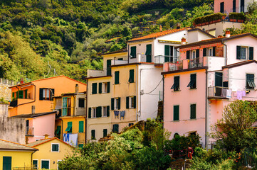 Fototapeta na wymiar It's Architecture of Riomaggiore, a village in province of La Spezia, Liguria, Italy. It's one of the lands of Cinque Terre, UNESCO World Heritage Site
