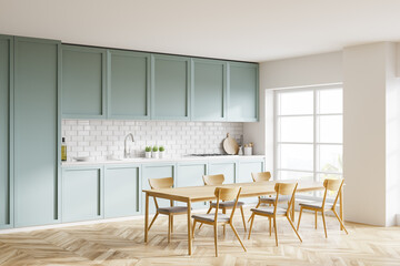 White and blue kitchen corner with table