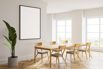 White dining room interior with poster