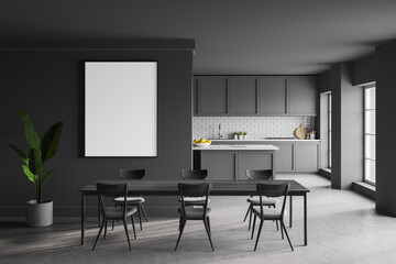 Dark grey kitchen with table and poster