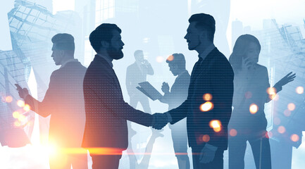 People shaking hands in city, teamwork