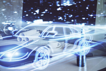 Obraz premium Desktop computer background in office with automobile hologram drawing. Multi exposure. Tech concept.