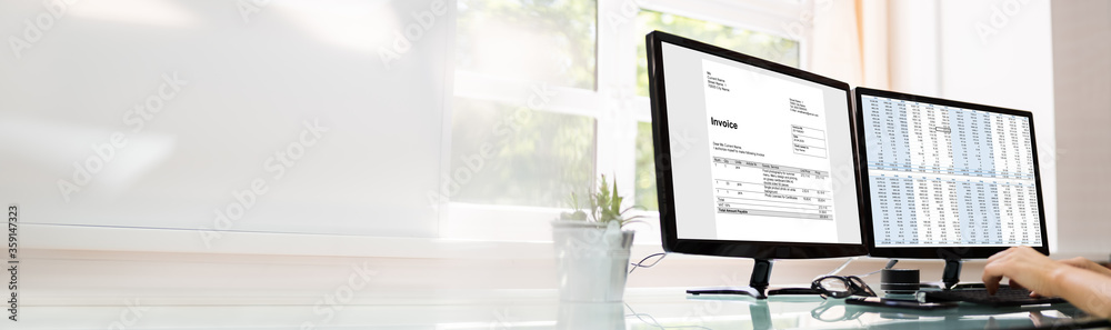 Poster analyst working with spreadsheet