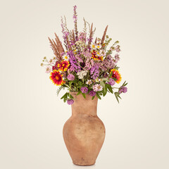 Beautiful Bright Wild flowers bouquet in vase. Holiday symbol