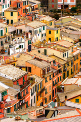 Fototapeta na wymiar It's Aerial view of the houses in Vernazza (Vulnetia), a small town in province of La Spezia, Liguria, Italy. It's one of the lands of Cinque Terre, UNESCO World Heritage Site