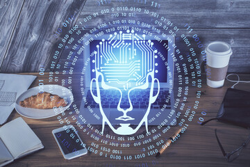 Multi exposure of work table with computer and brain hologram. Brainstorm concept.