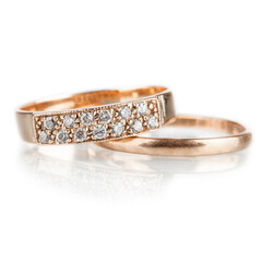 Two engagement gold wedding  rings, isolated on white. Love in Valentine Holiday and Wedding ...