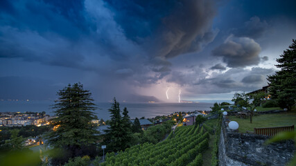 lightning strikes during a thunderstorm on Leman lake