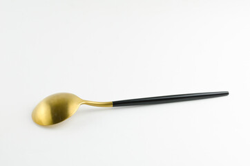 White golden spoon with modern design which suitable for foods decorating and luxury restaurant