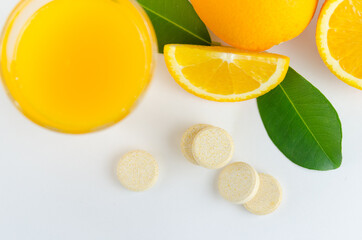 Multivitamin effervescent tablet pills. Vitamin C soluble pills. Fizzy Vitamin C for Drink