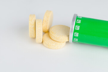 Multivitamin effervescent tablet pills. Vitamin C soluble pills. Fizzy Vitamin C for Drink