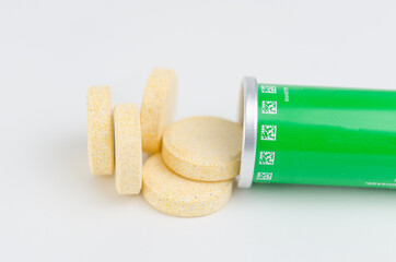 Multivitamin effervescent tablet pills. Vitamin C soluble pills. Fizzy Vitamin C for Drink
