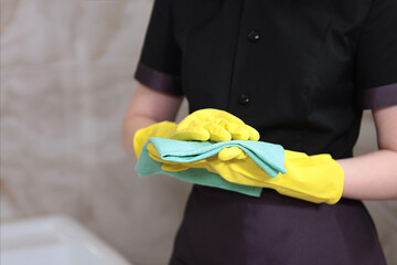 Cleanliness and hygiene in the bathroom. Cleaning in an expensive hotel or at home. Unrecognizable photo. Copy of the space.