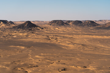 Fototapeta na wymiar Landscape of mountains and desert in Black desert, Egypt