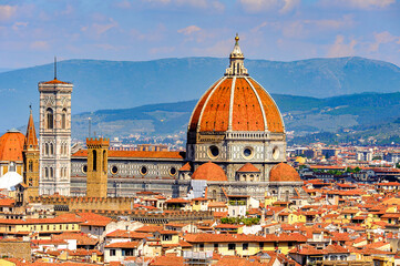 Fototapeta na wymiar It's Cathedral of Santa Maria del Fiore in Tuscany, Florence, Italy. View from the Michelangelo Square
