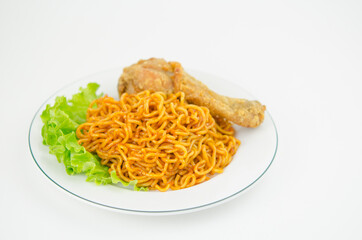Spicy stir-fried instant noodles with a chicken's drumstick. Trendy Korean food