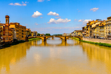 It's River Arno and architecture in Florence, Italy.