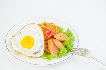 stir-fried instant noodles with omelet and sausage and lettuce